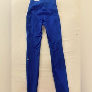 2 pair of Lululemon leggings- royal blue and black, both size 0.